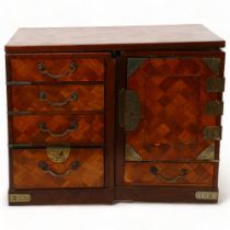 A small Japanese Meiji Period travelling cabinet, circa 1900, allover parquetry inlaid decoration