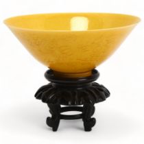 A delicate Chinese yellow glaze porcelain bowl, with incised dragon decorated surround, 6