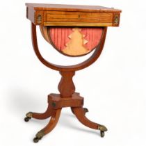 Regency brass inlaid mahogany sewing table, with rising top, drawer below with yoke shaped support