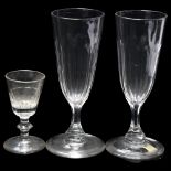 A pair of early 19th century glasses with cut bowls, height 16cm, and a smaller cordial glass (3)