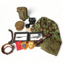 Military uniform, photograph album, camouflage belts and cap of RH Rigg, circa 1960s