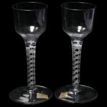 Pair of 18th century cordial glasses with milk opaque twist stems, height 14cm 1 glass has a chip on