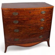 A George III mahogany bow-front chest of 4 long graduated drawers, with marquetry inlaid top,