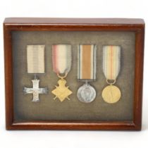 A Military Cross group of 4 Great War miniature medals, mounted in Spink & Son glazed mahogany