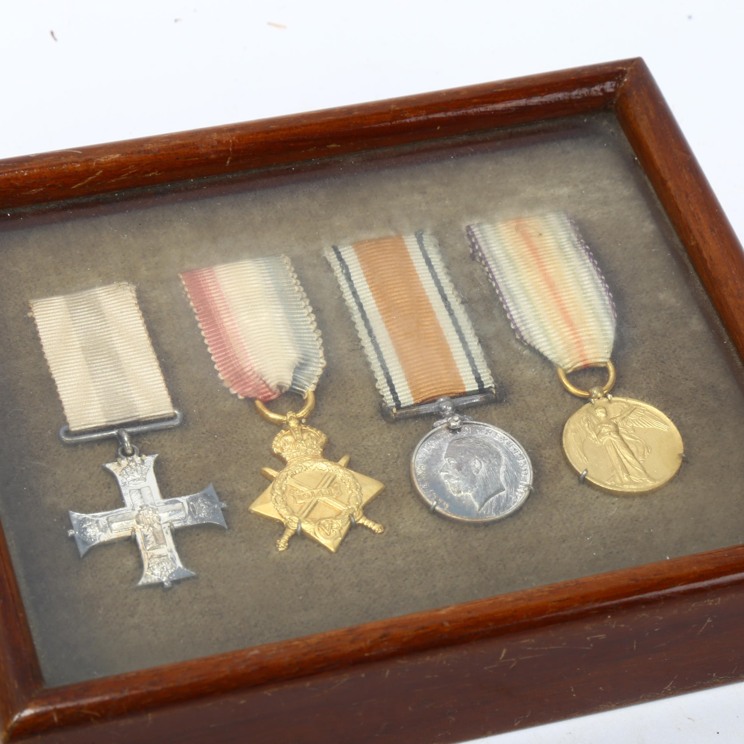 A Military Cross group of 4 Great War miniature medals, mounted in Spink & Son glazed mahogany - Image 2 of 3