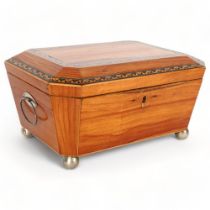 19th century satinwood and parquetry banded sarcophagus shaped sewing box, hinged lid with tray