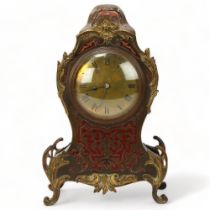 Late 19th century tortoiseshell and brass Boulle marquetry balloon-cased mantel clock, with brass