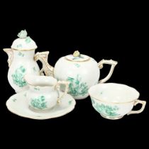 Herend porcelain tea-for-one set, with hand painted and gilded decoration and floral knops Hot water