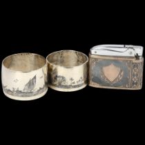 2 Iraqi silver and niello napkin rings, largest 4.5cm, and a Siam sterling and niello Ronson