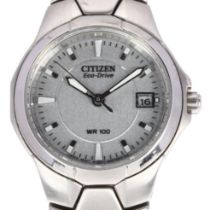 CITIZEN - a lady's stainless steel Eco-Drive WR100 quartz calendar bracelet watch, ref. E011-