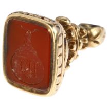 A 19th century carnelian seal fob, intaglio carved depicting hand clutching snake's crest above