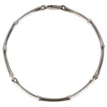 DINNY HALL - a modern 18ct white gold bamboo link bracelet, maker DHM, band width 3.3mm, 17.1g No