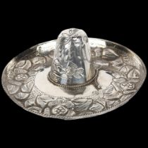 A Mexican sterling silver sombrero ashtray, maker SG, 13.5cm, 1.4oz Pointed top of hat has 2 small