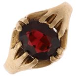 A mid-20th century 9ct gold garnet gypsy ring, maker A&Co, London 1967, claw set with oval mixed-cut