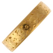 A mid-20th century 22ct gold wedding band ring, maker WW Ltd, London 1961, floral engraved