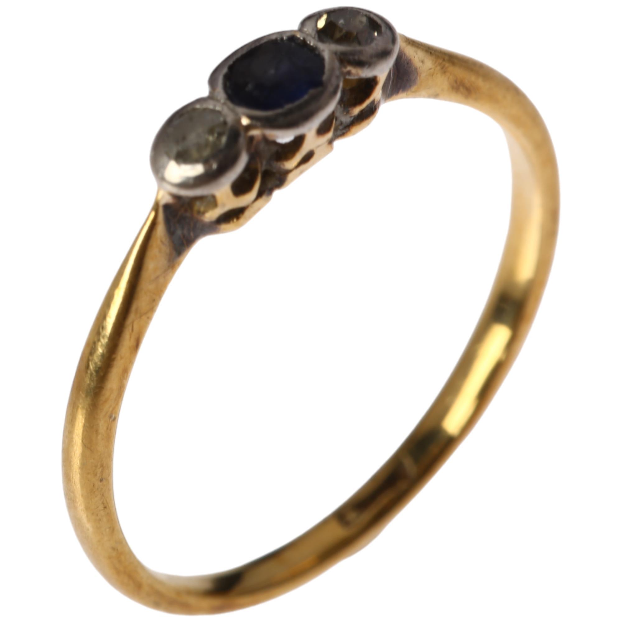 An early 20th century 18ct gold three stone sapphire and diamond ring, total diamond content - Image 3 of 4