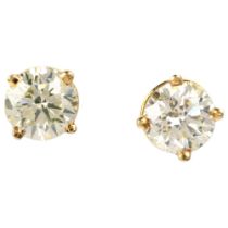 A pair of 18ct gold solitaire diamond earrings, each claw set with a 0.55ct round brilliant-cut