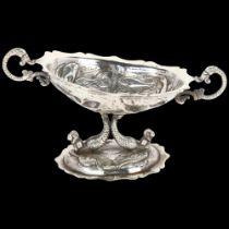 A 19th century Spanish silver pedestal table salt, with relief embossed fish decoration and