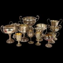 A quantity of silver trophy cups, 26oz weighable Lot sold as seen unless specific item(s) requested