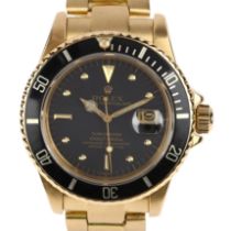 ROLEX - an 18ct gold Transitional Submariner Oyster Perpetual Date automatic bracelet watch, ref.