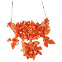 An Italian 14ct rose gold coral floral collar necklace, set with relief carved leaf flowerhead and