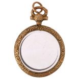 An early 20th century 9ct gold double-sided photo locket pendant, maker WHC, Chester 1905, 37.4mm,