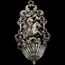 A German unmarked silver holy water receptacle, with relief embossed cavalier decoration, height