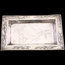 A Chinese export silver dressing table tray, retailed by Tuck Chang, circa 1910, rectangular form,