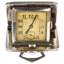 An Art Deco sterling silver travelling purse watch, circa 1930s, silvered dial with Arabic numerals,