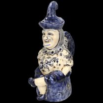 French blue and white faience pottery lidded Toby jug, height 33cm Glaze chips around the edge of