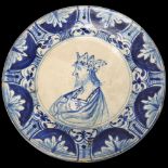 Delft blue and white pottery plate with portrait of a King, diameter 25cm Several small glaze