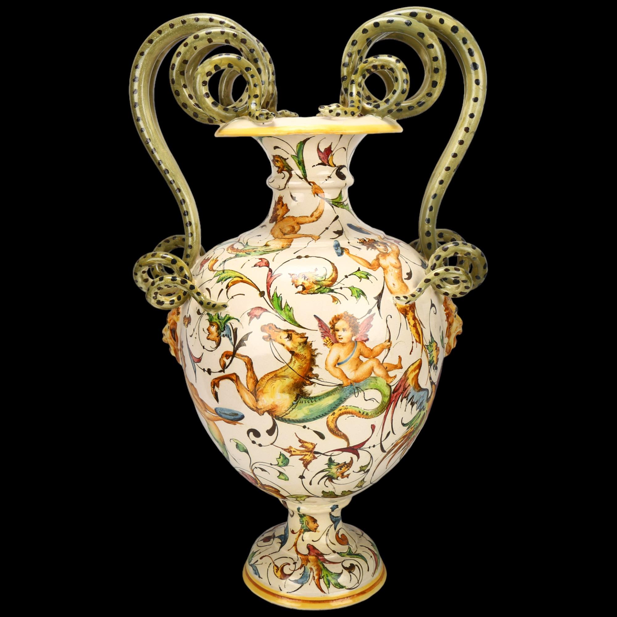 Large Italian faience pottery vase, with snake handles and painted Classical figures, height 54cm