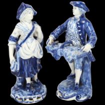 2 Delft blue and white pottery standing figures, height 16cm The male figure has a chip on the top