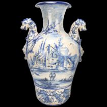 Large Italian blue and white pottery vase, with dragon and mask handles, 52cm Good condition