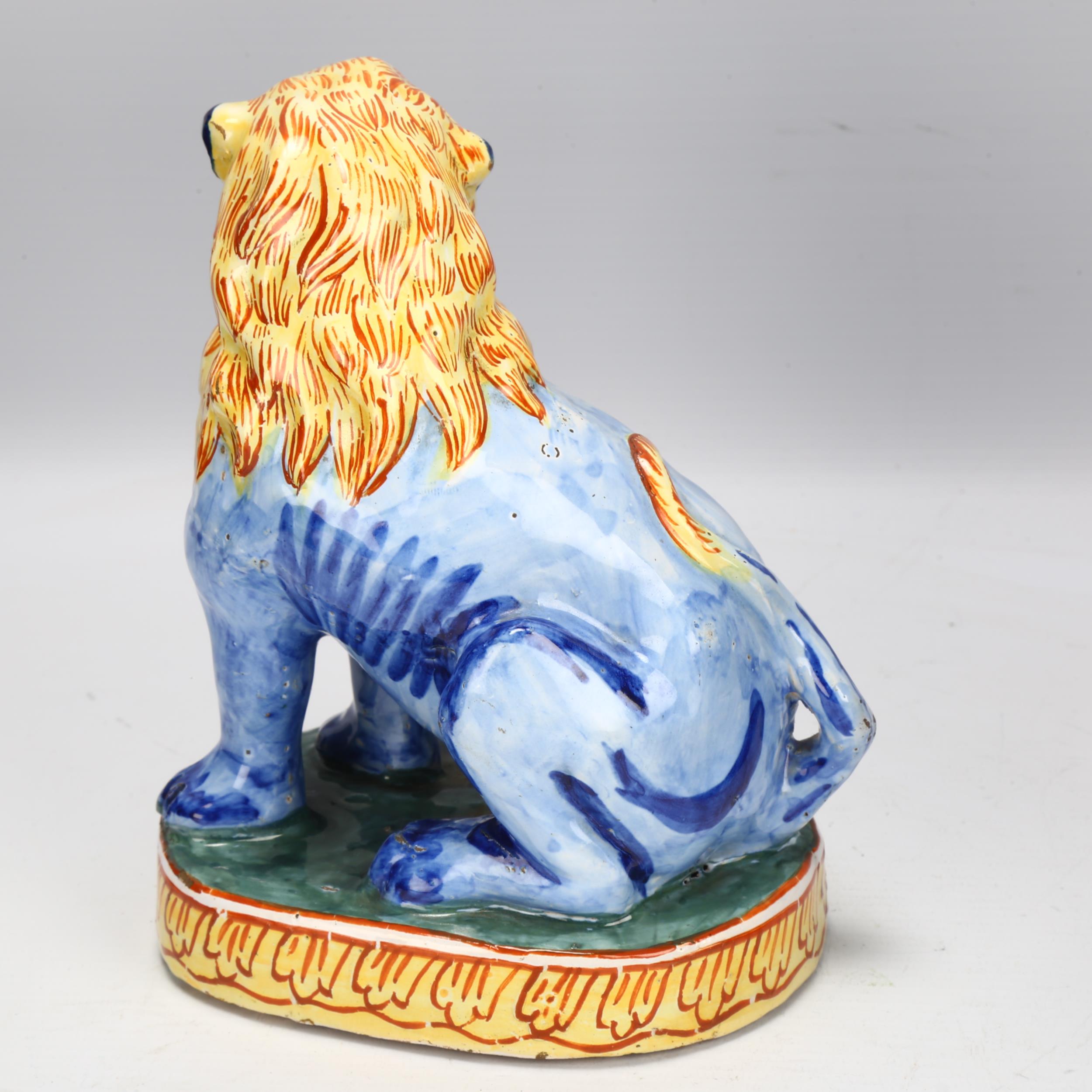 Dutch Delft polychrome pottery lion, height 17cm Small area of glaze rubbing on the tail, tiny glaze - Image 2 of 3