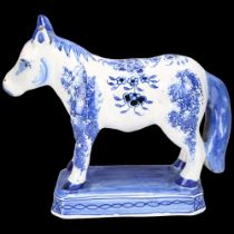 Delft blue and white pottery horse, length 17cm, height 15cm Tiny glaze chip on the ear