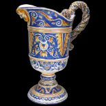 French Majolica pottery jug, with rope twist handle and mask decorated spout, height 32cm Handle rim
