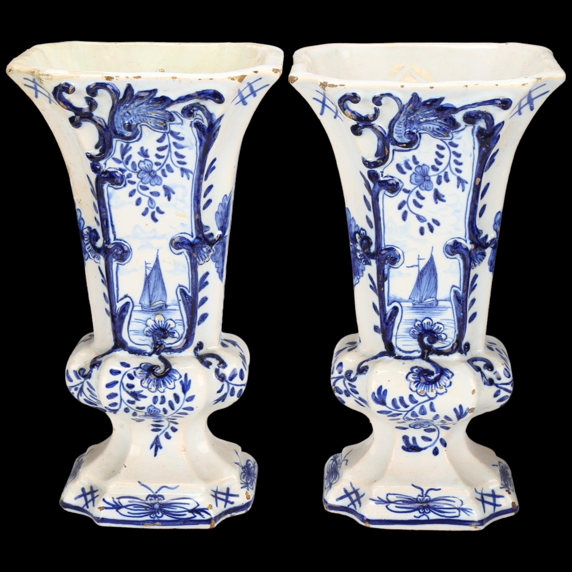 Pair of Delft blue and white pottery square-section flared vases, height 19cm 1 vase has restoration