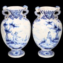 Pair of Delft blue and white pottery vases, with serpent handles, height 16cm Good condition