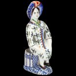 Delft polychrome pottery table salt figure, height 18cm Glaze chips around the edge of the bonnet