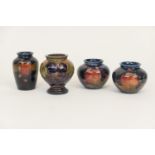 Pair of Moorcroft 'Pomengranate' small baluster pots (second quality), impressed facsimile signature