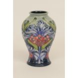 Moorcroft 'Florian Lilac' ovoid vase, circa 2005, designed by Emma Bossons, Moorcroft red dot (