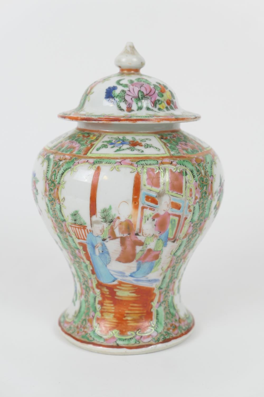 Chinese famille rose jar and cover, 19th Century, of inverted baluster form, painted with panels