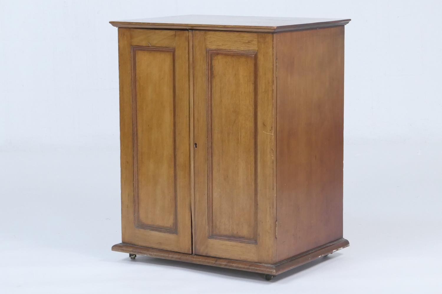 Edwardian mahogany cutlery chest, having two recessed panel doors opening to five graduating drawers