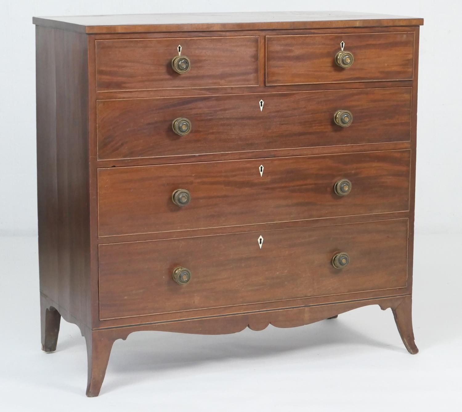 Late George III mahogany chest of drawers, circa 1820, fitted with two short and three long