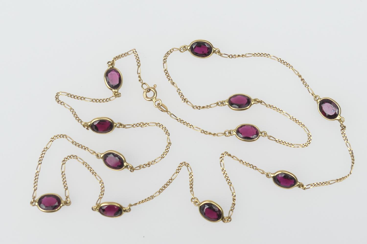 18ct gold figaro garnet necklace, with bolt ring clip, length 60cm, gross weight approx. 9.4g