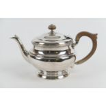 George V silver teapot, Birmingham 1930, plain baluster form with wooden finial and handle, height