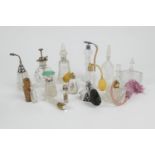 Small collection of scent bottles comprising: silver and green guilloche enamel topped salts bottle,