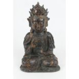 Sino-Tibetan bronze boddhisatva, seated in dhayanasana, the left hand holding a gourd, mid brown