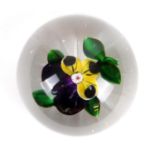 Baccarat pansy miniature paperweight, circa 1850, worked with a single flower with green leaves in a